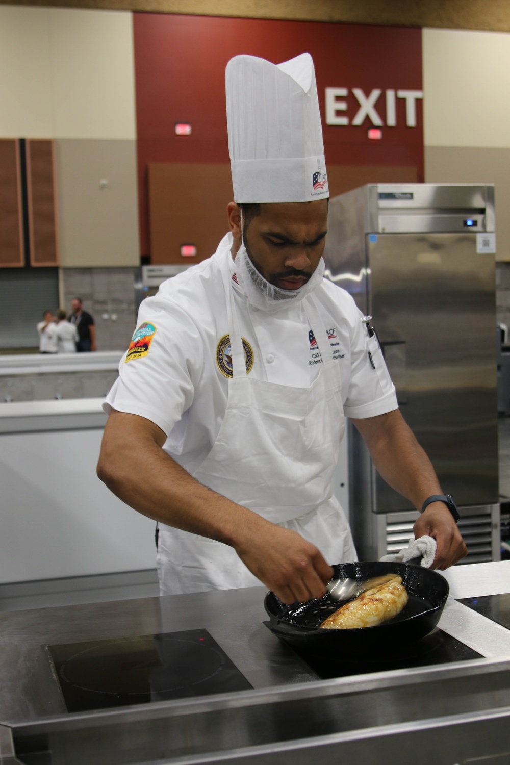 Culinary Specialist 2nd Class Larry Burns competes at the American Culinary Federation (ACF) National Convention in Phoenix, Ariz. on July 16, 2024.