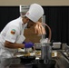 Culinary Specialist 2nd Class Larry Burns competes at the American Culinary Federation (ACF) National Convention in Phoenix, Ariz. on July 16, 2024.