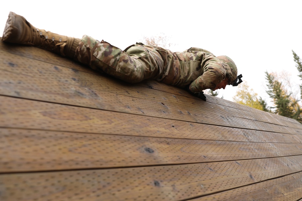 U.S. Soldier Tackles Obstacle in Best Medic Competition