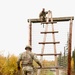 U.S. Soldier Approaches Ladder Obstacle in Best Medic Competition