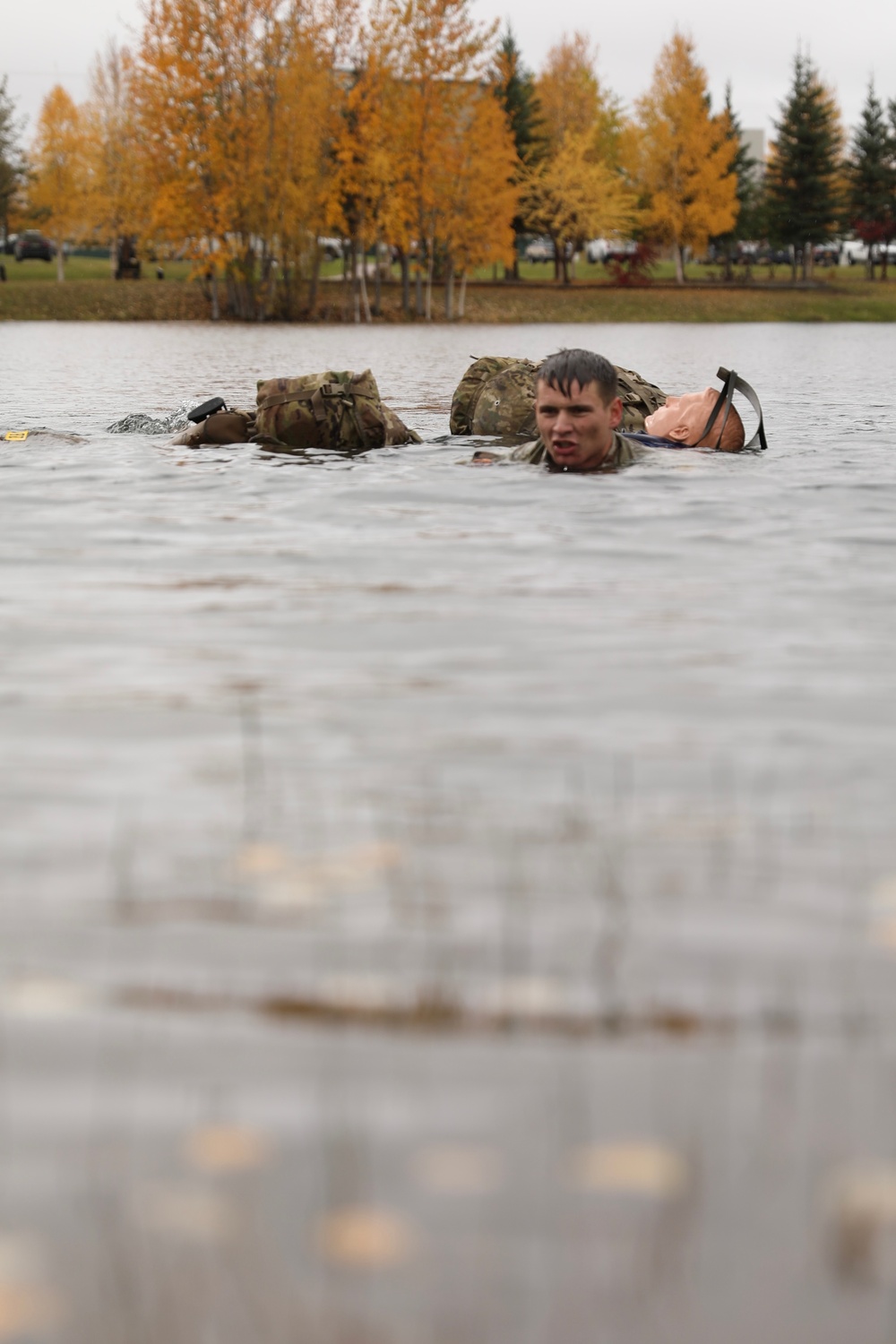 U.S. Soldiers Perform Combat Water Survival in Best Medic Competition