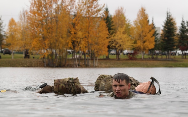 U.S. Soldiers Perform Combat Water Survival in Best Medic Competition