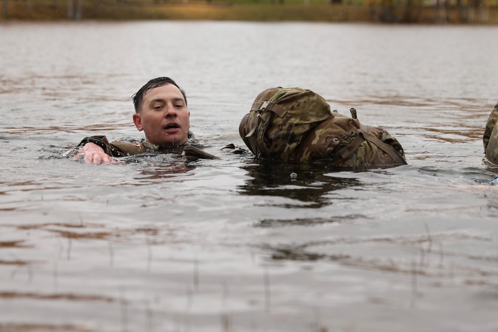 U.S. Soldier Pulls Gear in Combat Water Survival Event