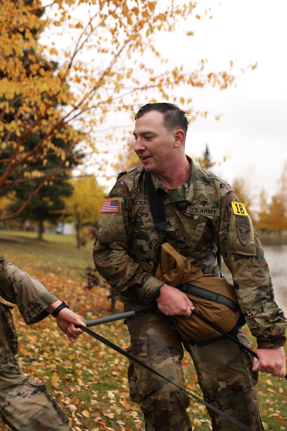 U.S. Soldier Assists in Combat Water Survival Event