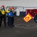 USS Ronald Reagan (CVN 76) Sailors conduct training during a general quarters drill