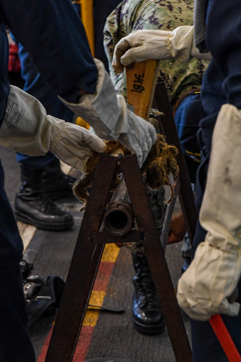 USS Ronald Reagan (CVN 76) Sailors conduct training during a general quarters drill