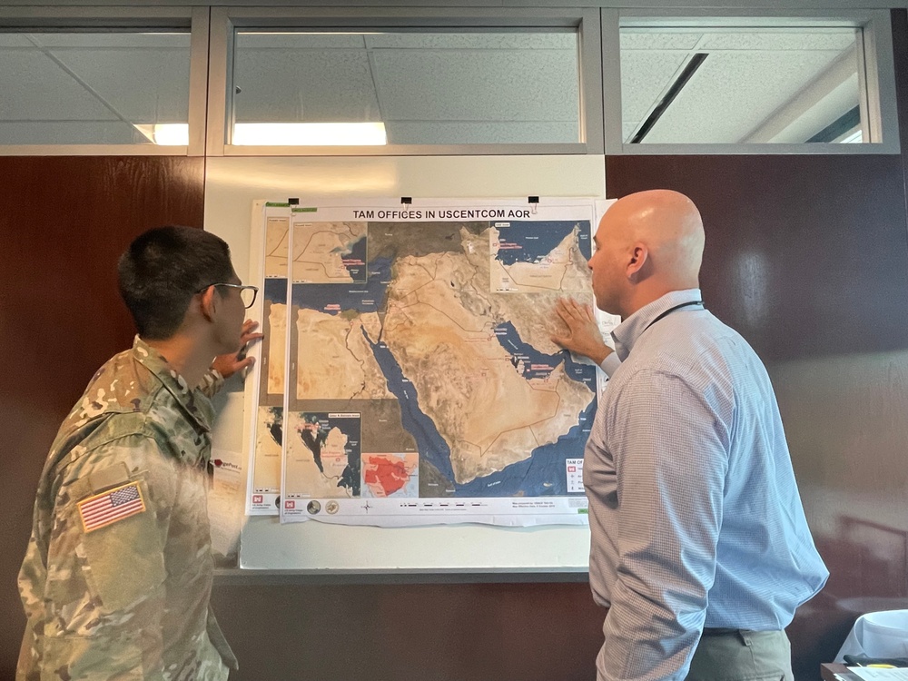 Cadet Sohn and Norberto 'Tito' Santana Reviewing Middle East Operations