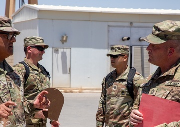 CSMs Richardson and Trejo recognize Soldiers during battlefield circulation [Photo 1 of 8]