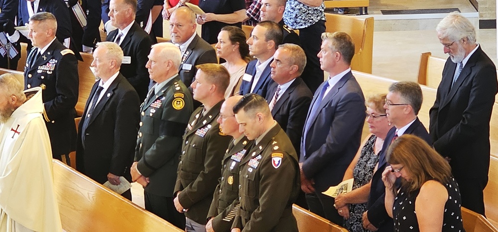 Remembering POWs: America remembers Bataan Death March veteran Sgt. Jack Hohlfeld with special service; welcomes him home to Wisconsin