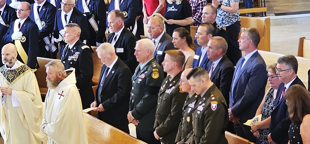 Remembering POWs: America remembers Bataan Death March veteran Sgt. Jack Hohlfeld with special service; welcomes him home to Wisconsin