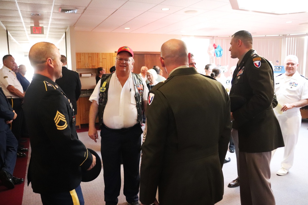 Remembering POWs: America remembers Bataan Death March veteran Sgt. Jack Hohlfeld with special service; welcomes him home to Wisconsin