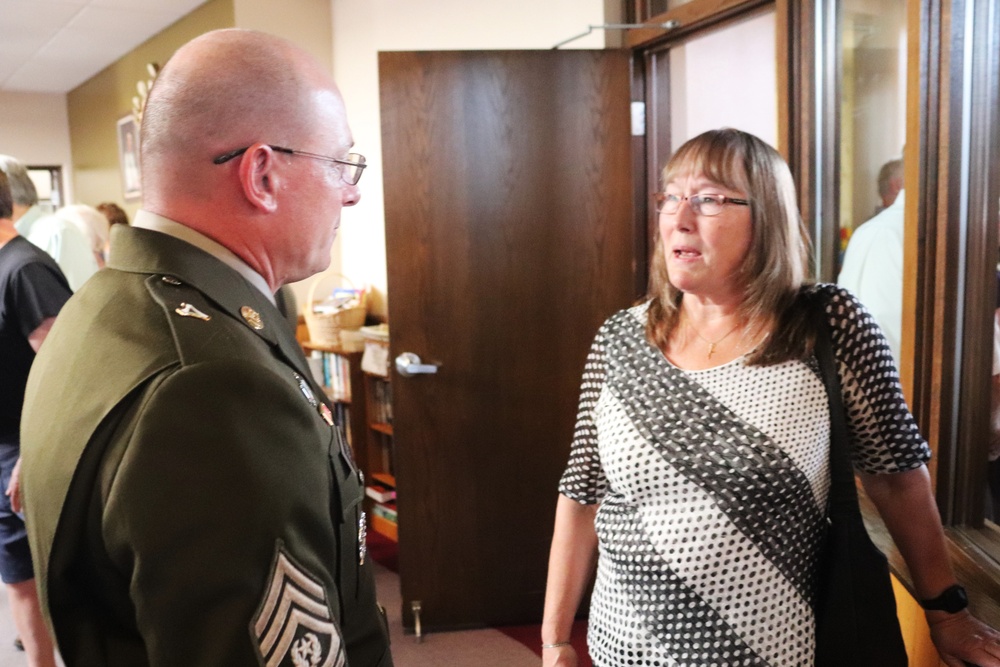 Remembering POWs: America remembers Bataan Death March veteran Sgt. Jack Hohlfeld with special service; welcomes him home to Wisconsin