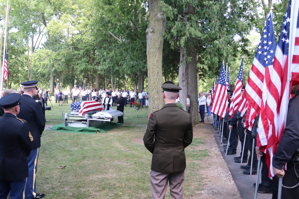 Remembering POWs: America remembers Bataan Death March veteran Sgt. Jack Hohlfeld with special service; welcomes him home to Wisconsin