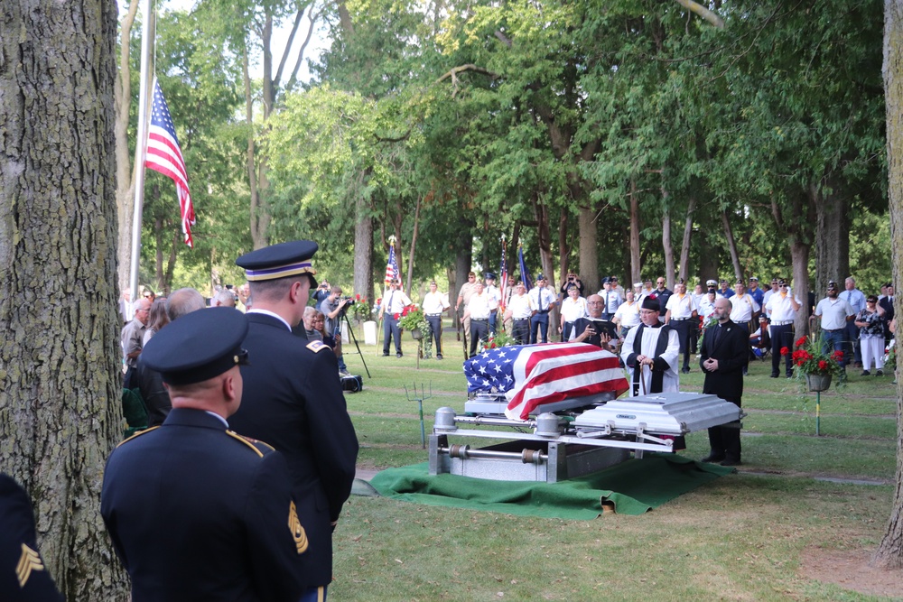 Remembering POWs: America remembers Bataan Death March veteran Sgt. Jack Hohlfeld with special service; welcomes him home to Wisconsin