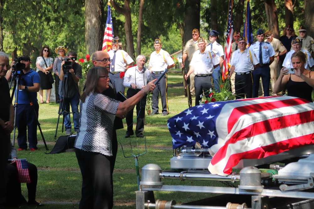 Remembering POWs: America remembers Bataan Death March veteran Sgt. Jack Hohlfeld with special service; welcomes him home to Wisconsin