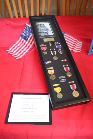 Monsignor Steve Kachel speaks about Sgt. Jack Hohlfeld during Mass of Christian Burial Service for World War II Bataan Death March survivor