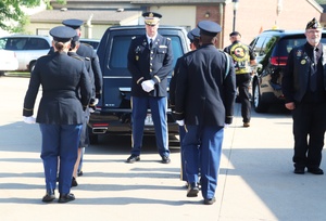 Monsignor Steve Kachel speaks about Sgt. Jack Hohlfeld during Mass of Christian Burial Service for World War II Bataan Death March survivor