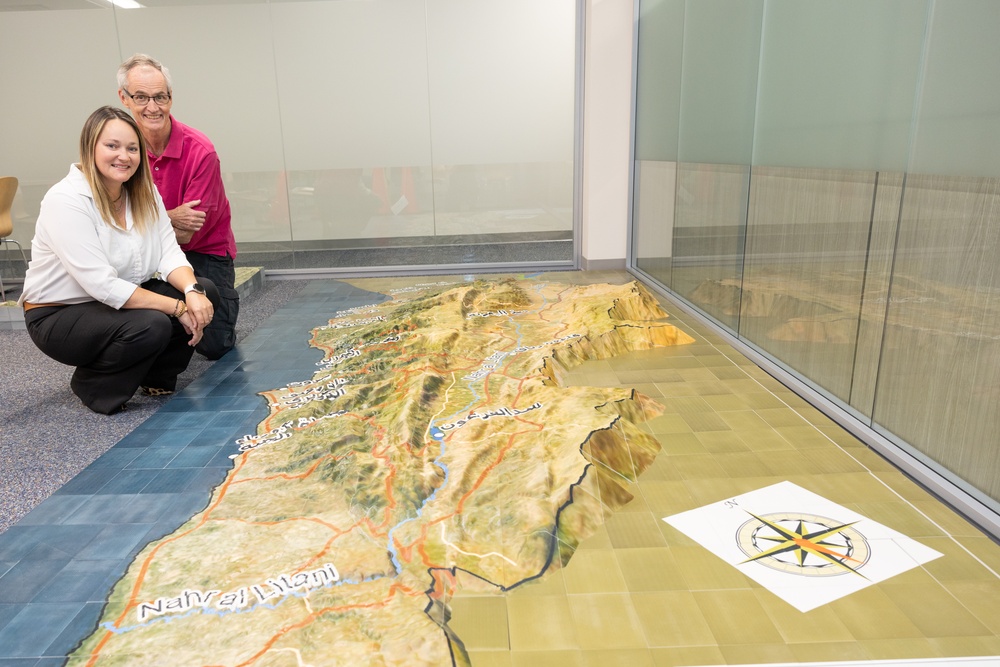 Kristine Brannon and Mark Whitacre Beside 3D Map of Lebanon