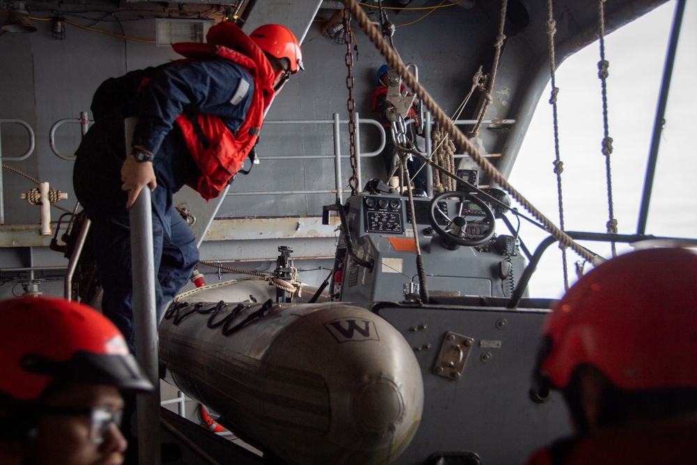 Nimitz Sailors Prepare a RHIB