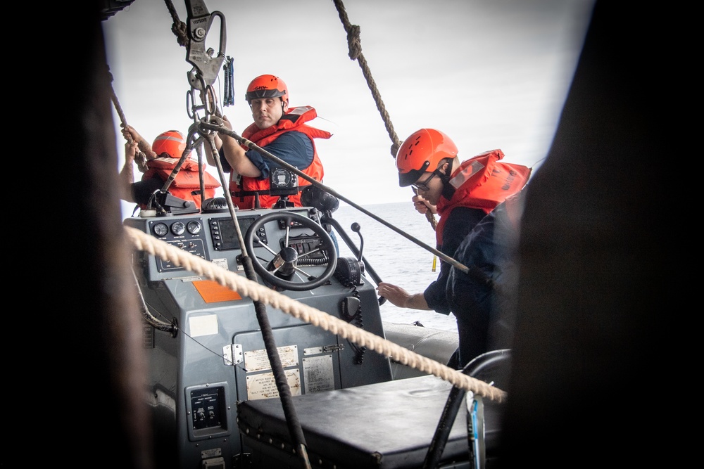 Sailors Lower a RHIB