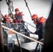 Sailors Lower a RHIB