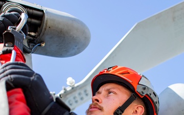 Navy Aircrewman participate in photo event