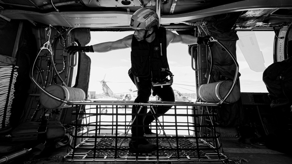 Navy Aircrewman participate in photo event