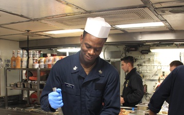 Chief petty officer selects serve brunch aboard USS Lake Erie