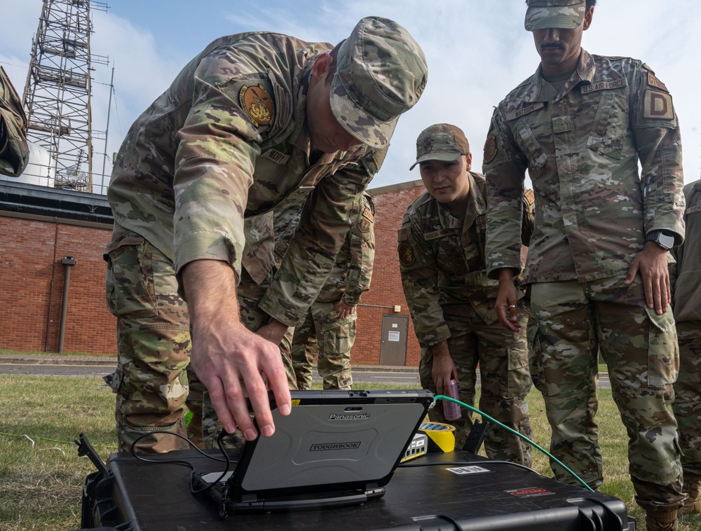 100th Communications Squadron provide network connectivity during a simulated network blackout