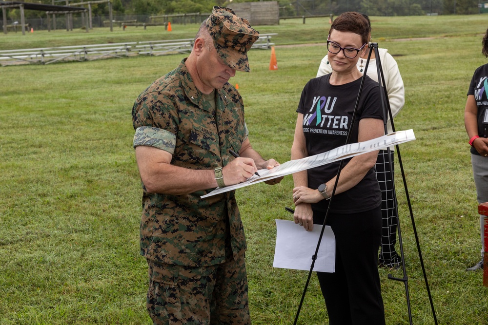 MARFORCOM Marines participate in a Suicide Prevention Month HITT workout