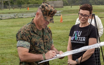 MARFORCOM Marines participate in a Suicide Prevention Month HITT workout