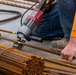 Chipping away old concrete to preserve Montgomery Dam piers for the future