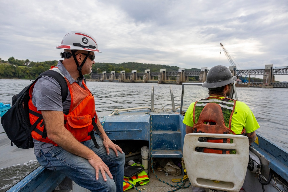 Chipping away old concrete to preserve Montgomery Dam piers for the future