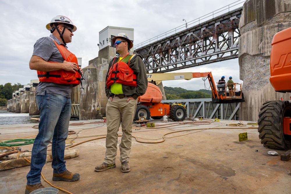 Chipping away old concrete to preserve Montgomery Dam piers for the future