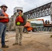 Chipping away old concrete to preserve Montgomery Dam piers for the future