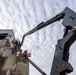 Chipping away old concrete to preserve Montgomery Dam piers for the future