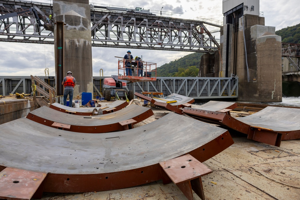 Chipping away old concrete to preserve Montgomery Dam piers for the future