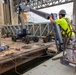 Chipping away old concrete to preserve Montgomery Dam piers for the future