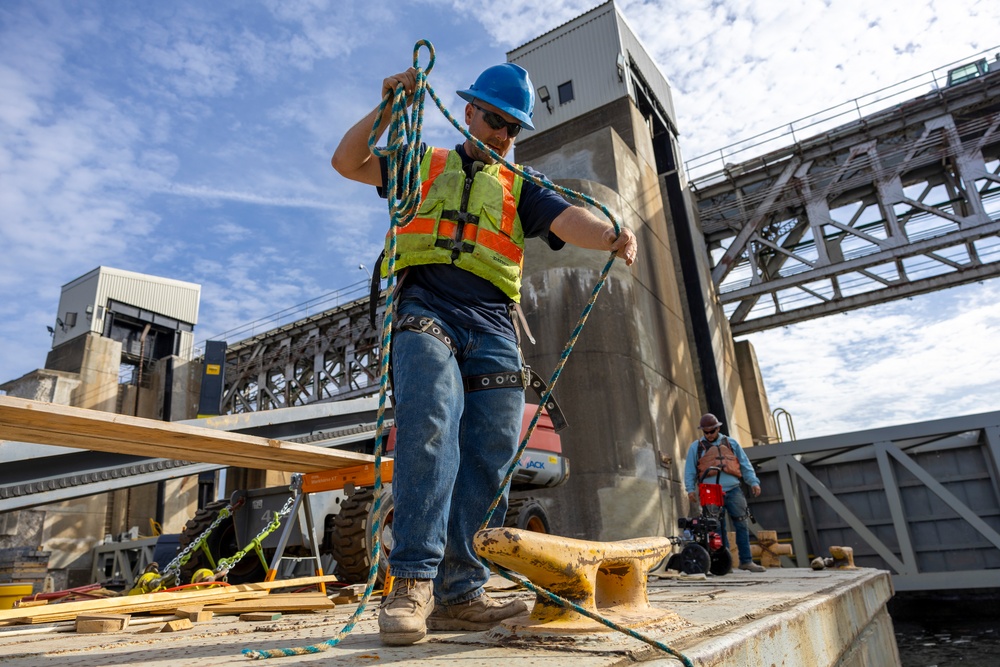 Chipping away old concrete to preserve Montgomery Dam piers for the future