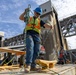 Chipping away old concrete to preserve Montgomery Dam piers for the future