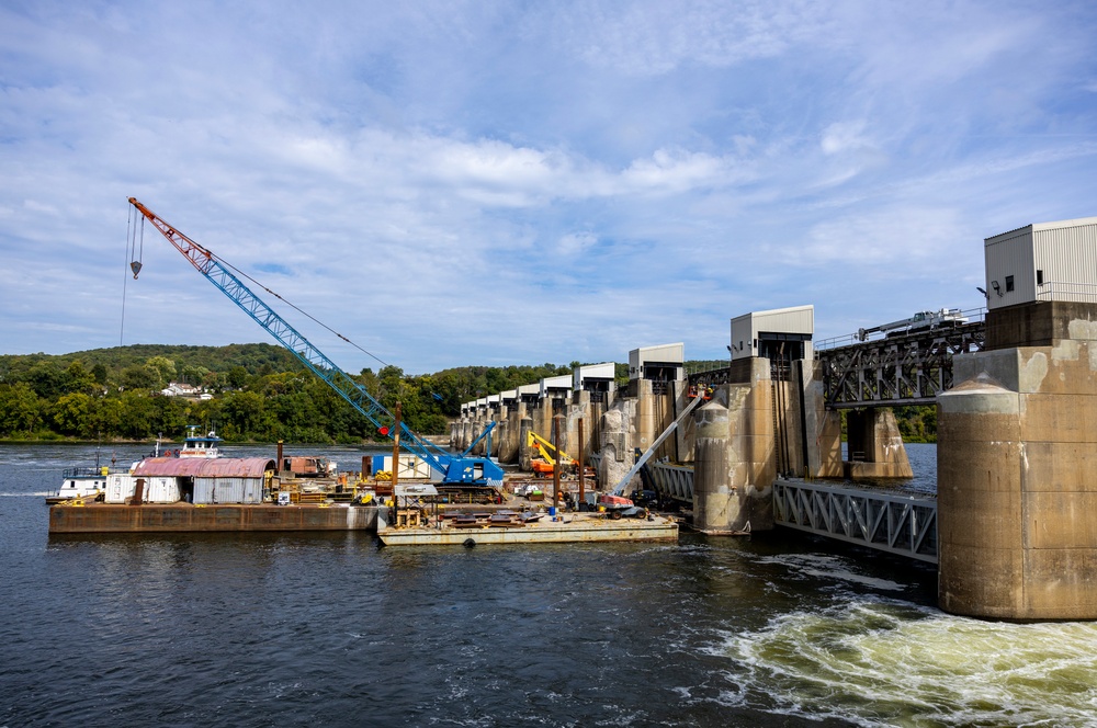 Chipping away old concrete to preserve Montgomery Dam piers for the future