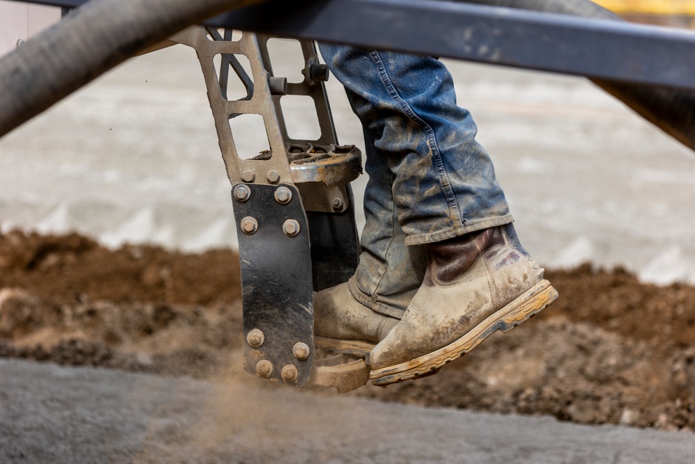 Chipping away old concrete to preserve Montgomery Dam piers for the future