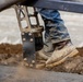 Chipping away old concrete to preserve Montgomery Dam piers for the future