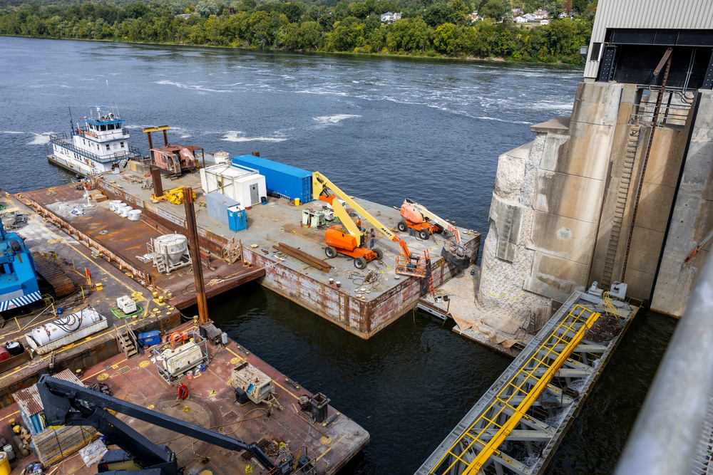 Chipping away old concrete to preserve Montgomery Dam piers for the future