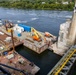 Chipping away old concrete to preserve Montgomery Dam piers for the future