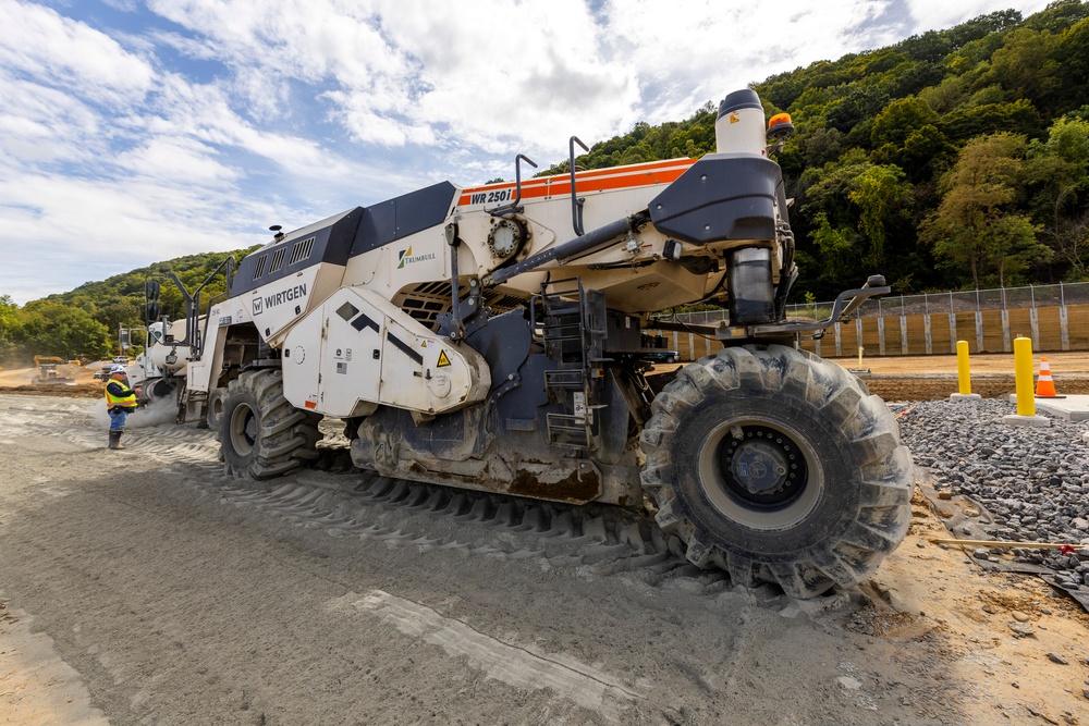 Chipping away old concrete to preserve Montgomery Dam piers for the future