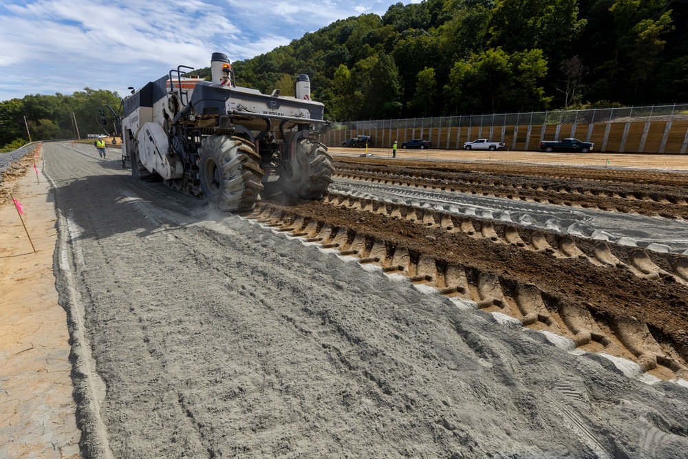 Chipping away old concrete to preserve Montgomery Dam piers for the future