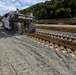 Chipping away old concrete to preserve Montgomery Dam piers for the future