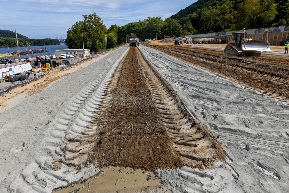 Chipping away old concrete to preserve Montgomery Dam piers for the future