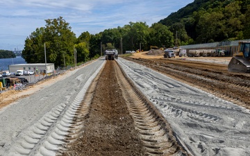 Chipping away old concrete to preserve Montgomery Dam piers for the future